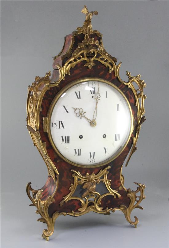 A 19th century French Louis XVI style ormolu mounted red tortoiseshell bracket clock, height 26in. bracket 13in.